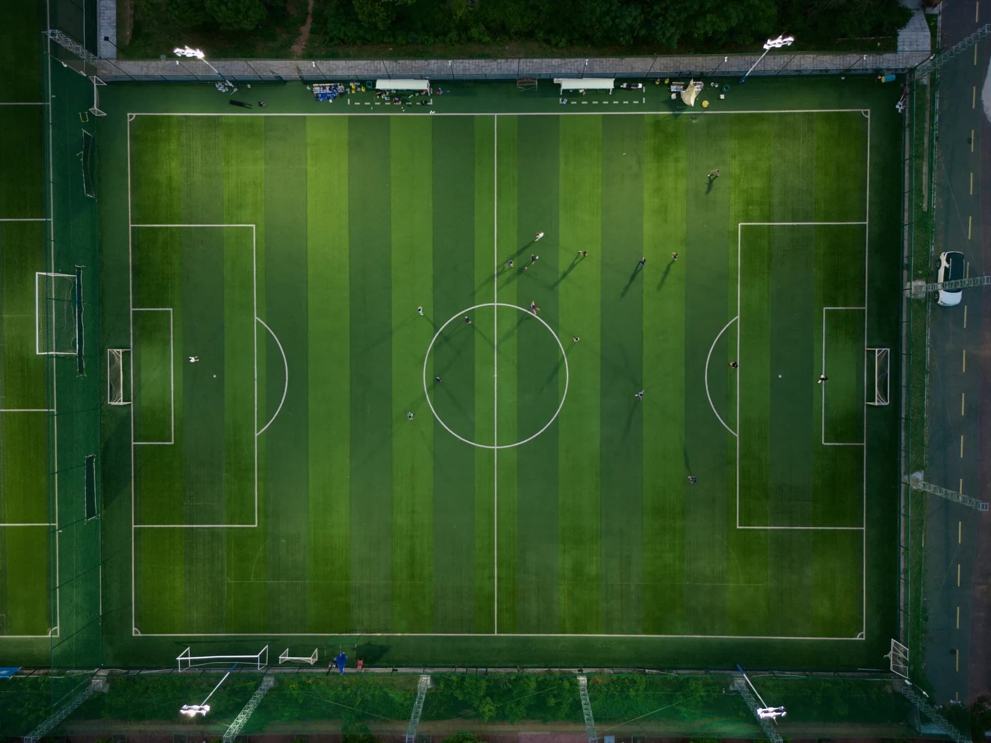 Players in action on the Konabari Turf pitch